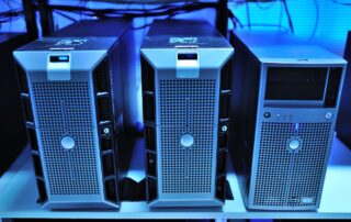 Close-up of rack-mounted server units with unlabeled panels in data center