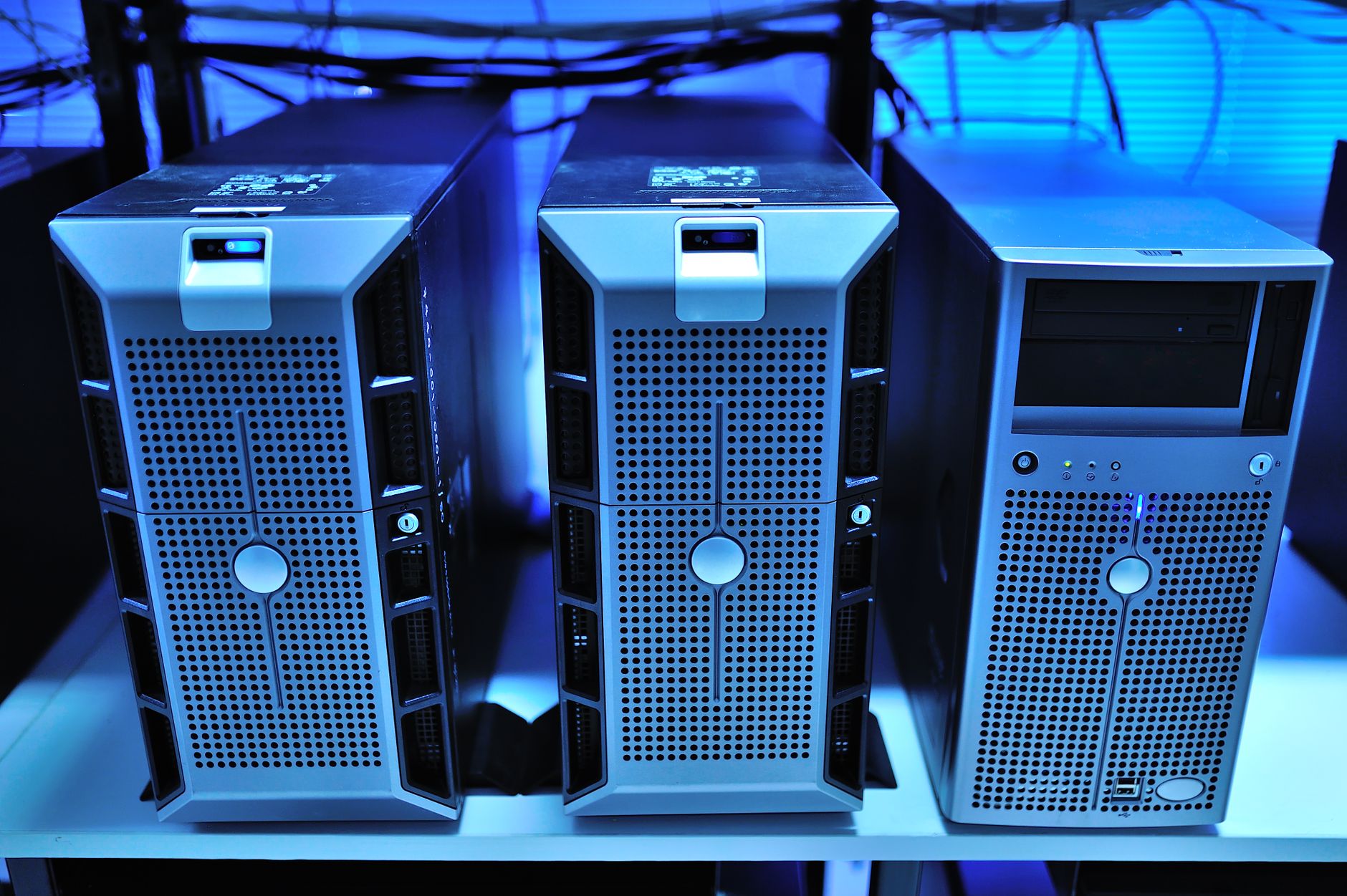 Close-up of rack-mounted server units with unlabeled panels in data center