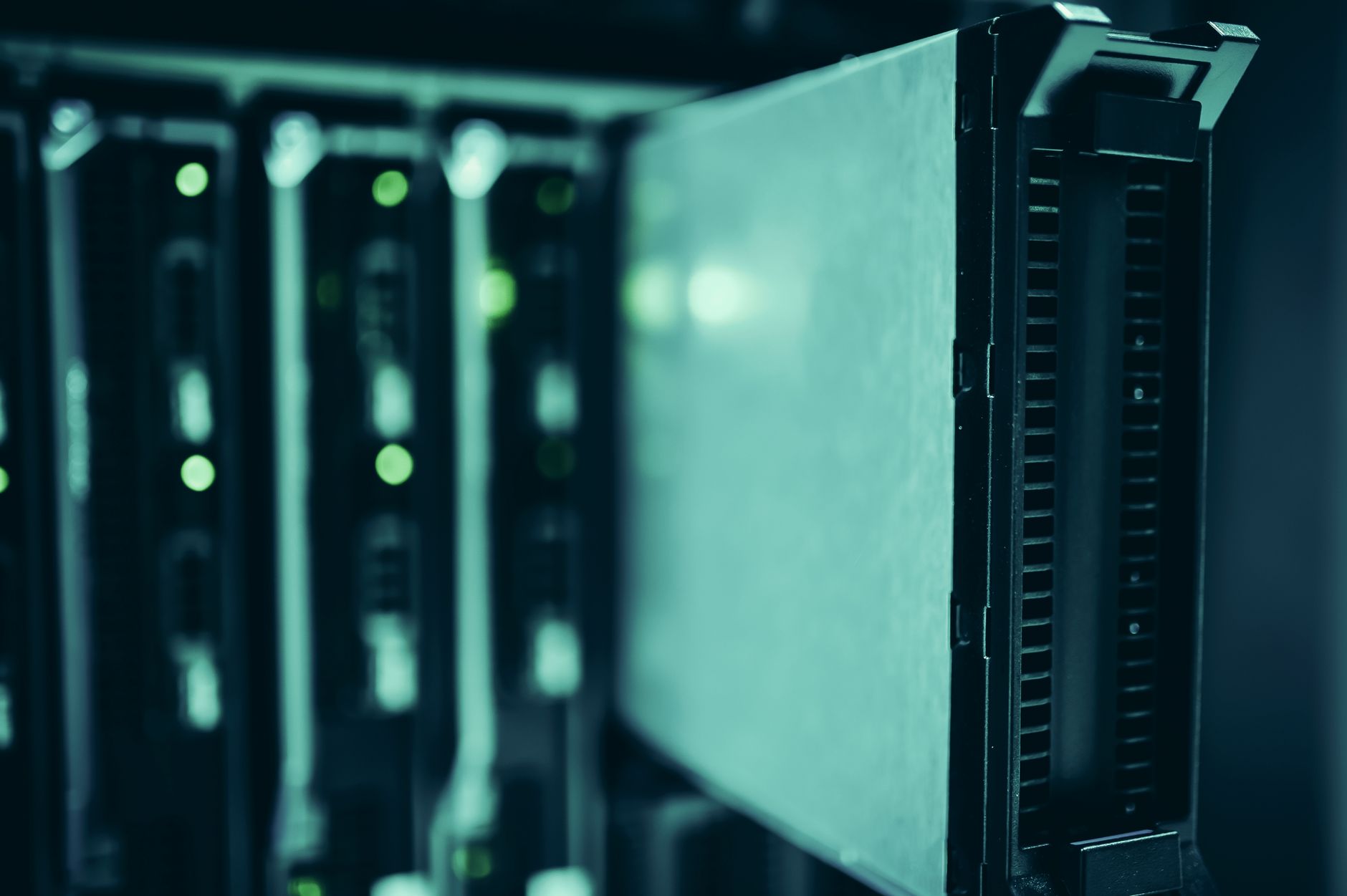 Rows of server racks in a data center facility